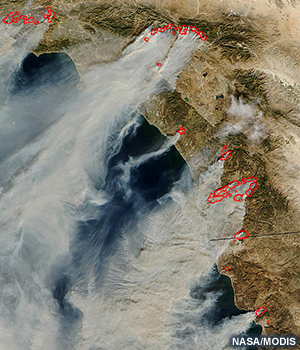 Satellite image of smoke plumes from 2003 Southern California wildfires.